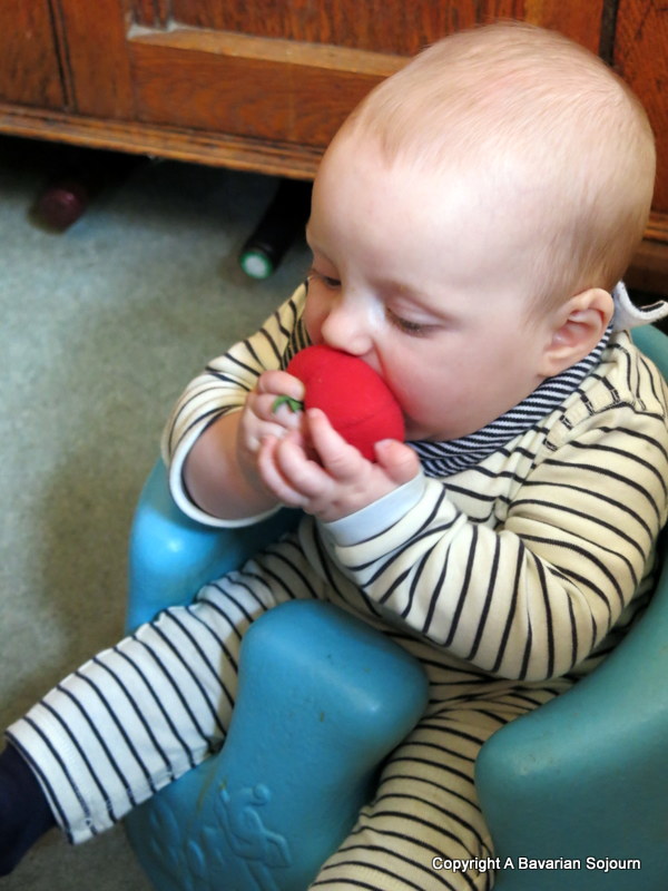 baby with tomato